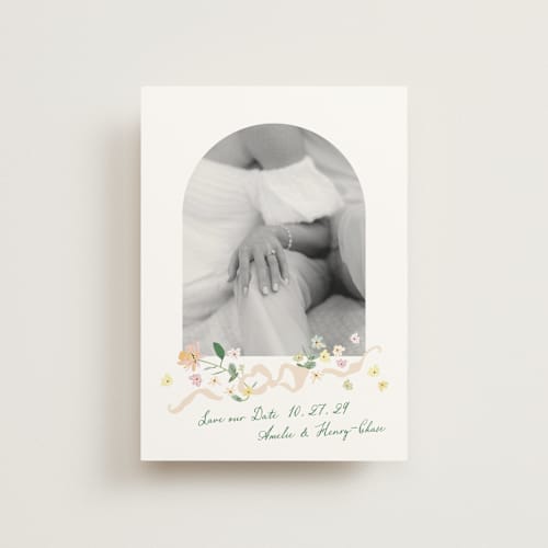 This is a spring save the date postcards with standard by Phrosné Barwood called spring draped garland printing on signature in postcard