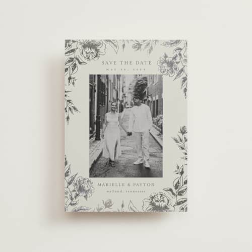 This is a steel save the date postcards with foil pressed by Chris Griffith called wildflower date printing on signature in postcard