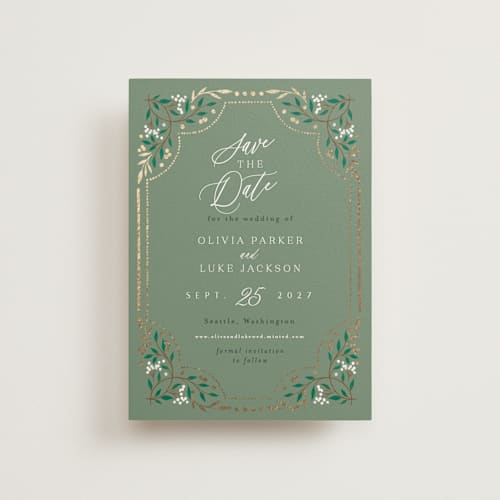 This is a evergreen save the date postcards with foil pressed by Alethea and Ruth called illuminated storybook printing on signature in postcard