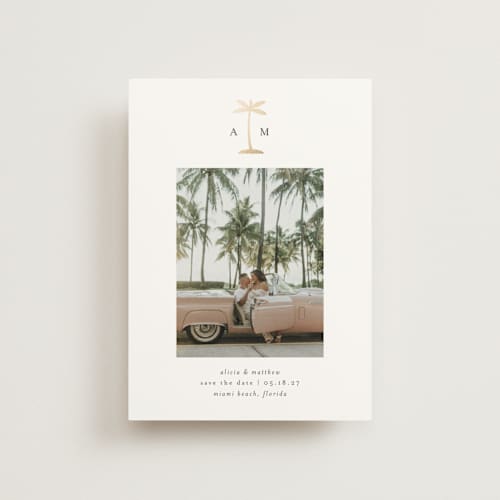 This is a coconut save the date postcards with foil pressed by Heather Schertzer called palm tree printing on signature in postcard