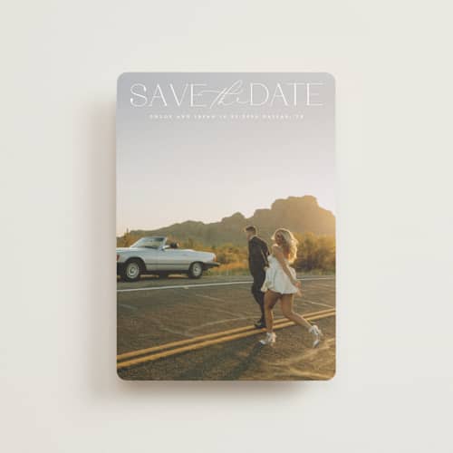 This is a ivory petite save the dates with standard by Maja Cunningham called prose printing on recycled smooth signature in petite