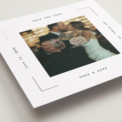 This is a pearl foil stamped save the date cards with foil pressed by Ana Sharpe called our snapshot printing on recycled smooth signature in square