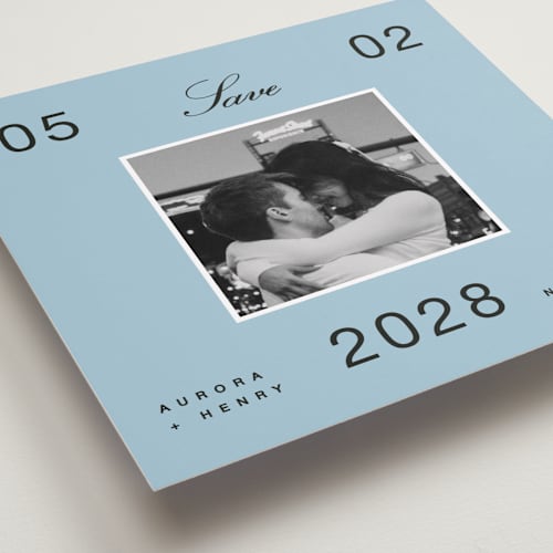 This is a wave save the date with standard by Blustery August called chess printing on recycled smooth signature in square