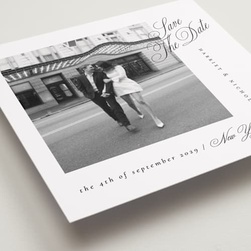 This is a noir slate save the date with standard by Ana de Sousa called written with love printing on recycled smooth signature in standard