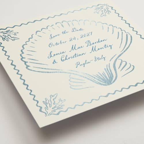 This is a ocean foil stamped save the date cards with foil pressed by Pati Cascino called puglia printing on signature in square