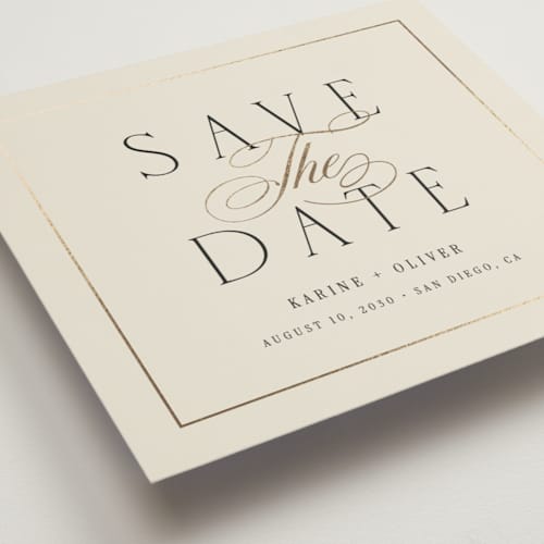This is a ivory foil stamped save the date cards with foil pressed by Ana Sharpe called heirloom union printing on signature in standard