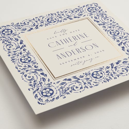 This is a dynasty blue foil stamped save the date cards with foil pressed by Ana de Sousa called tiled romance printing on signature in standard