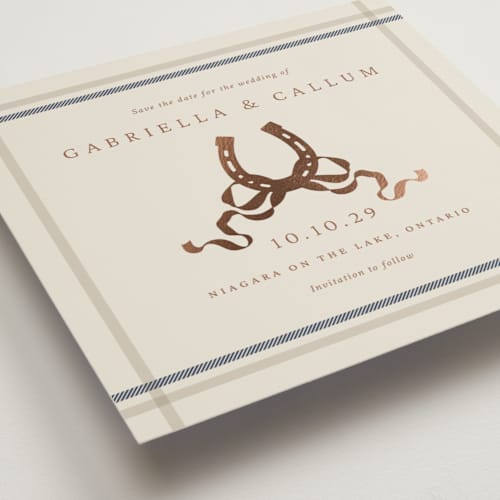 This is a midnight foil stamped save the date cards with foil pressed by Sam Dubeau called equestrian printing on signature in standard