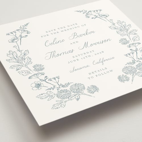 This is a cornflower save the date with standard by Hannah Bowman called toile frame printing on signature in square