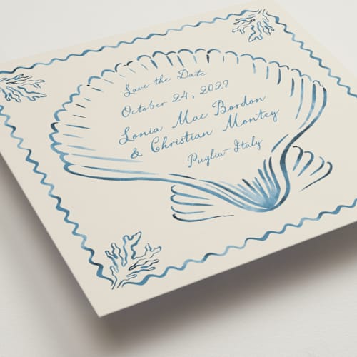 This is a ocean save the date with standard by Pati Cascino called puglia printing on signature in square
