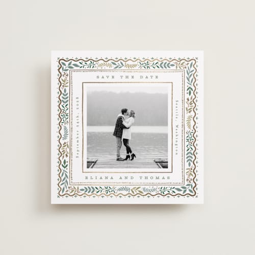 This is a snow foil stamped save the date cards with foil pressed by Alethea and Ruth called square leafy border printing on recycled smooth signature in square