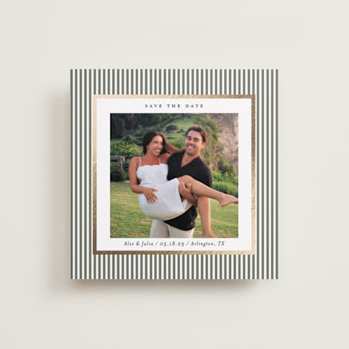 This is a sage green foil stamped save the date cards with foil pressed by Lucrecia Caporale called striped frame printing on recycled smooth signature in standard