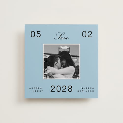 This is a wave save the date with standard by Blustery August called chess printing on recycled smooth signature in square