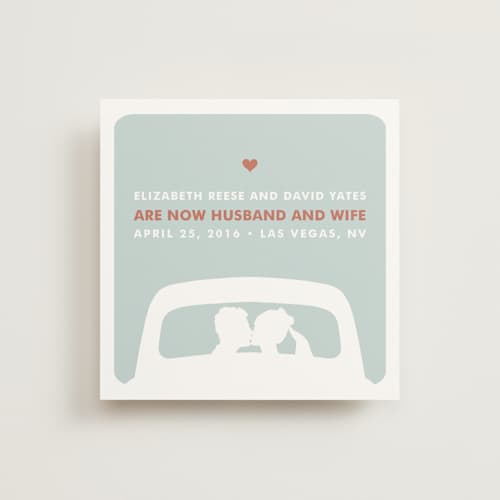 This is a light teal wedding announcements with standard by Three Kisses Studio called just married printing on signature in standard