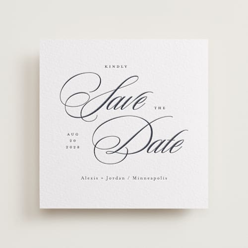 This is a soft black save the date with letterpress by Michelle Taylor called square script printing on white cotton in standard