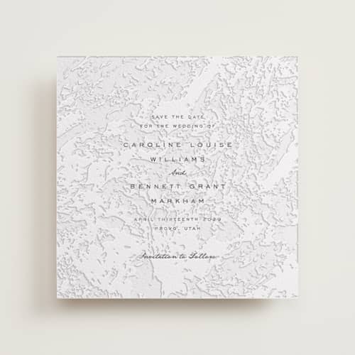 This is a soft black save the date with letterpress by Erin L. Wilson called subtle marble printing on white cotton in standard