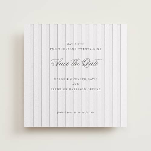 This is a soft black save the date with letterpress by Baumbirdy called striped printing on white cotton in standard