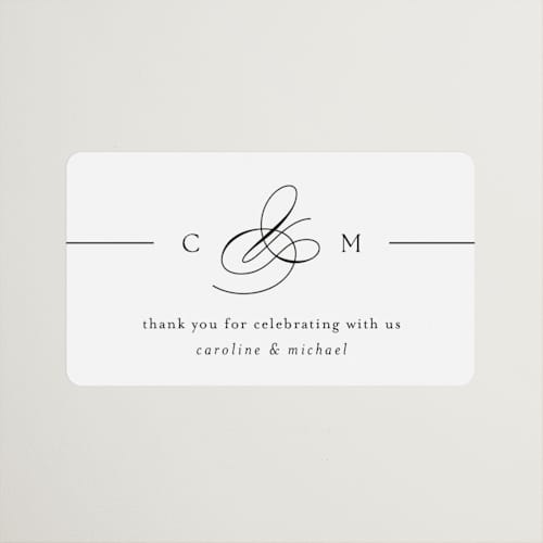 This is a silk wedding favor labels with standard by Kelly Schmidt called framed monogram printing on uncoated sticker paper in sticker