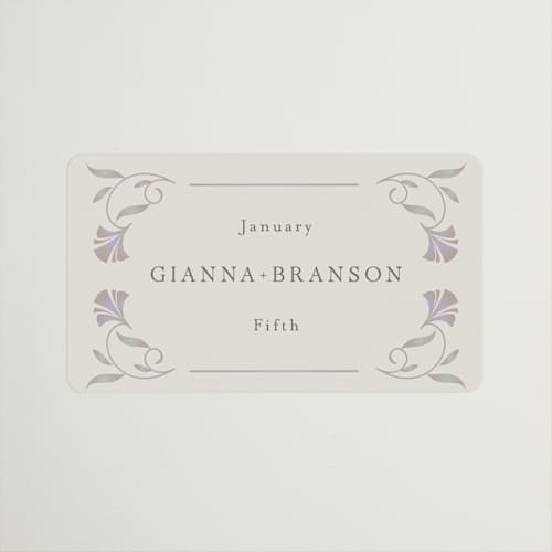 This is a vanilla wedding favor labels with standard by lori jacobs wemple called deco nouveau printing on uncoated sticker paper in sticker
