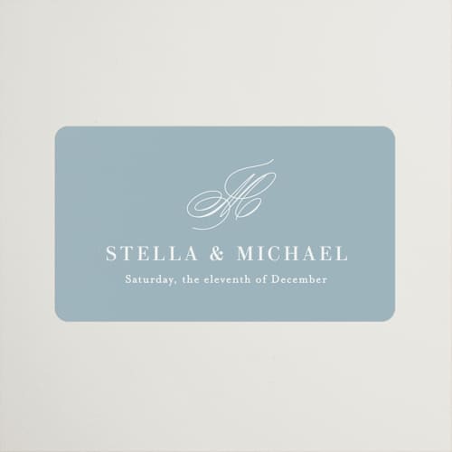 This is a powder blue wedding favor labels with standard by Jennifer Postorino called polished printing on uncoated sticker paper in sticker
