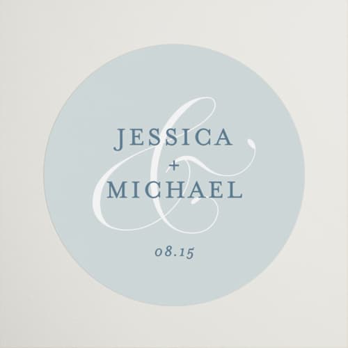 This is a dusty blue wedding favor labels with standard by Jennifer Postorino called empire printing on uncoated sticker paper in sticker