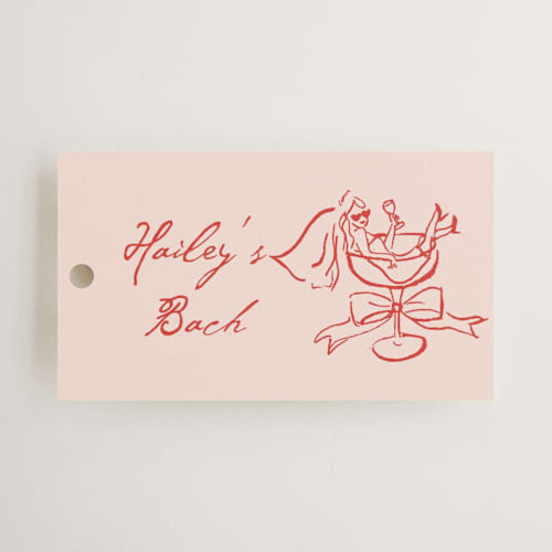 This is a scarlet wedding favor tags with standard by Cass Loh called cheers to love printing on signature in tag