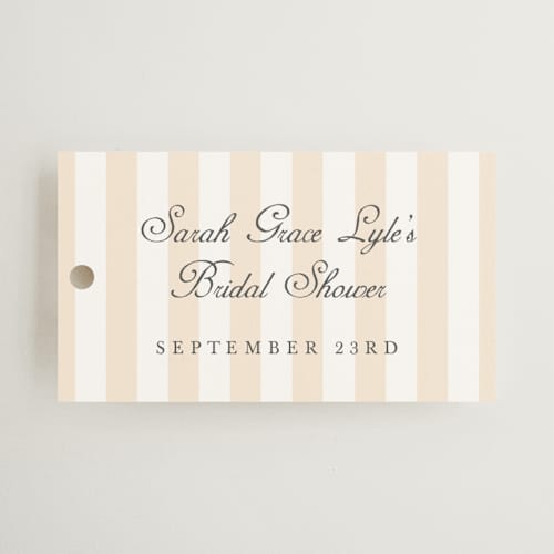 This is a peach gift tags with standard by Sara Hicks Malone called awning stripe printing on signature in tag