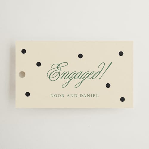 This is a off white wedding favor tags with standard by Studio Suku called polka dot printing on signature in tag