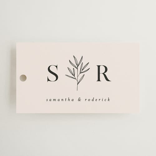 This is a taupe wedding favor tags with standard by Kelly Schmidt called italia printing on signature in tag