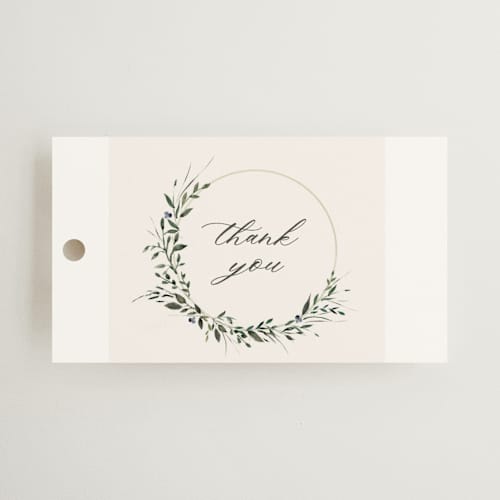 This is a champagne wedding favor tags with standard by Lori Wemple called green wreath printing on signature in tag