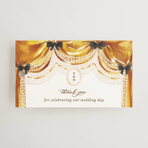 This is a golden wedding favor tags with standard by Claudia Orengo called tuileries printing on signature in tag