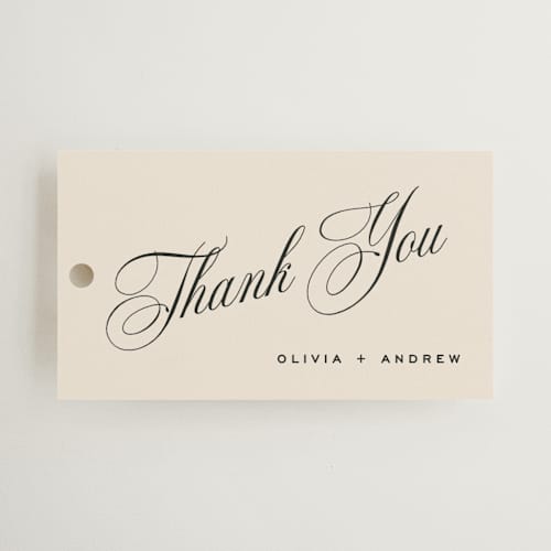 This is a almond wedding favor tags with standard by Eric Clegg called modern romance printing on signature in tag