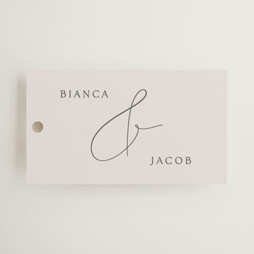 This is a ivory wedding favor tags with standard by Angela Thompson called eloquent printing on signature in tag