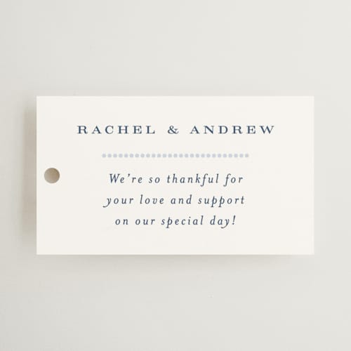This is a dusty blue wedding favor tags with standard by Janean Hinger called aurelia printing on signature in tag