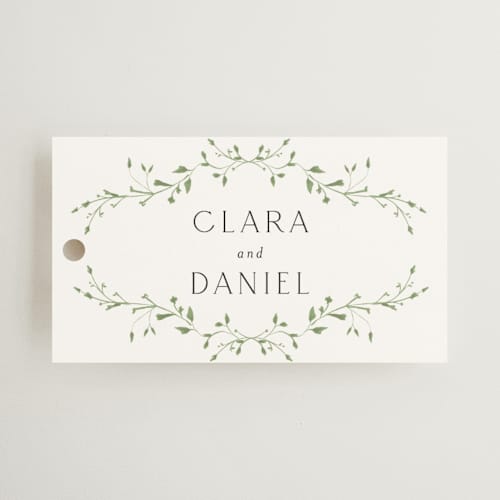 This is a alabaster wedding favor tags with standard by Susan Moyal called delicate vine printing on signature in tag