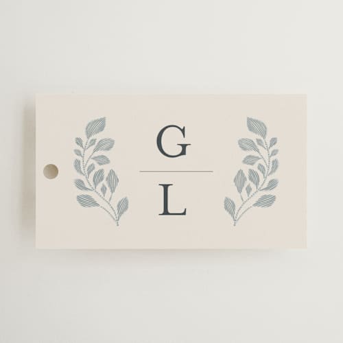 This is a dusty blue wedding favor tags with standard by Jen Owens called embroidered printing on signature in tag