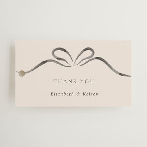 This is a tuxedo wedding favor tags with standard by Corinne Malesic called bow printing on signature in tag