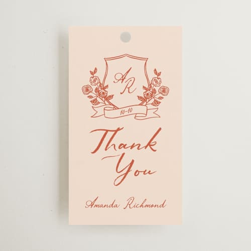 This is a peach gift tags with standard by Sherley Ferreira called bridal crest printing on signature in tag