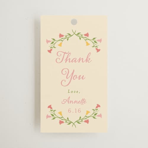 This is a golden gift tags with standard by Sarah Rosenthal called gardenia printing on signature in tag