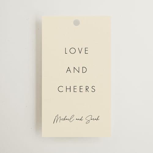 This is a champagne wedding favor tags with standard by mo kelley called a little shindig printing on signature in tag
