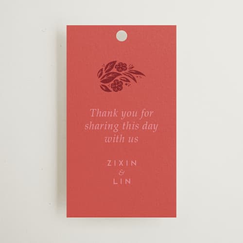 This is a ruby wedding favor tags with standard by Ghia Designs called fiery printing on signature in tag