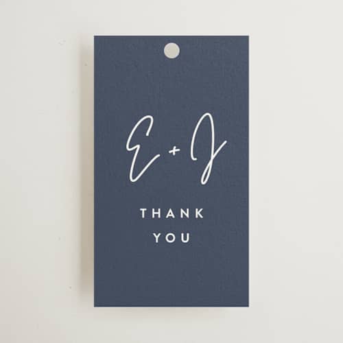 This is a navy wedding favor tags with standard by JoAnn Jinks called marked printing on signature in tag
