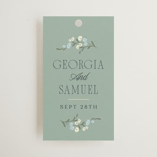 This is a butter mint wedding favor tags with standard by Laura Hankins called trailing garden printing on signature in tag
