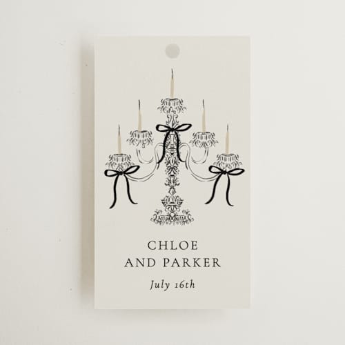 This is a noir wedding favor tags with standard by Jackie Crawford called hand illustrated whimsical chandelier printing on signature in tag