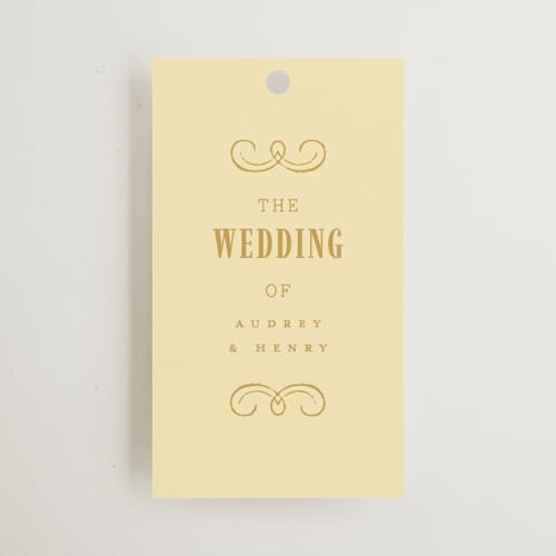 This is a butter wedding favor tags with standard by Nazia Hyder called vintage label printing on signature in tag