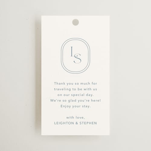 This is a lakeshore blue wedding favor tags with standard by Jennifer Postorino called leighton printing on signature in tag
