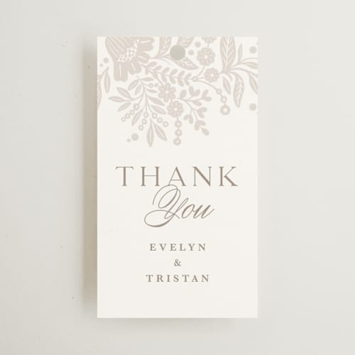 This is a cream wedding favor tags with standard by Kristen Smith called lace trim printing on signature in tag