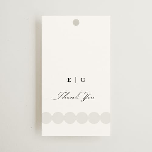 This is a silk wedding favor tags with standard by mo kelley called pearls printing on signature in tag