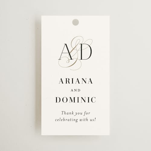 This is a cotton wedding favor tags with standard by Jennifer Postorino called gilded ampersand printing on signature in tag