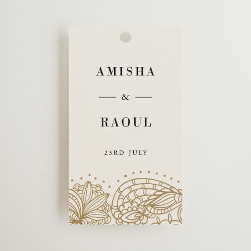 This is a champagne wedding favor tags with standard by Oma N. Ramkhelawan called elegant henna printing on signature in tag